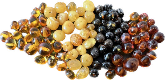 Produktbild von Amberdog Baltischer Bernstein Perlen in Barock Form mit gebohrtem Loch Honigfarben