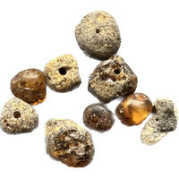 Produktbild von Amberdog Baltischer Bernstein Perlen XXL Kugelform grün mit Inklusen lose mit gebohrtem Loch