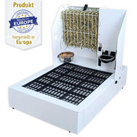 Produktbild von Breker Futterstation aus Metall für Kaninchen mit Käfigtoilette, Heuraufe, Trinkflasche und Napf in Weiß