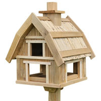 Produktbild von Conni Oberkircher's Vogelhaus Pondruff mit Strohdach und Ständer aus Holz in Braun