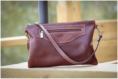 Damen Clutch Pénélope Emma aus Leder und Stahl in Braun – Bild 1 von 1