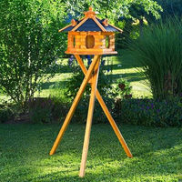 Produktbild von Deko-Shop-Hannusch Vogelhaus aus Holz mit Futtersilo und Solarbeleuchtung in Größe L