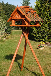 Produktbild von Deko-Shop-Hannusch Vogelhaus mit Holzschindeldach und Solarbeleuchtung inklusive Ständer in Braun und Grün