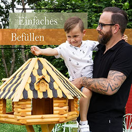 Deko-Shop-Hannusch XXL Luxus Vogelhaus aus Holz mit Solarbeleuchtung und Ständer in Braun-Grün – Bild 1 von 6