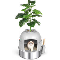 Produktbild von Dekorative Katzenbox von Liangpin Jiazuo mit Kunstpflanze und Edelstahl-Design inklusive Schaufel, Kies und Carbon-Filter