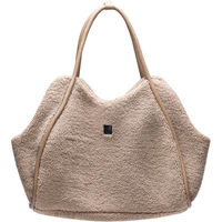 Produktbild von Designed by Lotte Transporttasche Tebby beige aus Plüsch für kleine Hunde