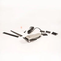 Produktbild von Duvo+ Schermaschine Clipper Basic Set 10W für Hunde mit 4 Aufsätzen in Weiß und Silber