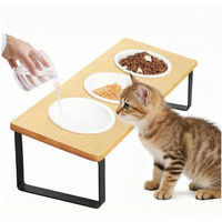 Produktbild von Elegear Futternapf für Hunde und Katzen aus Bambus mit 3 Keramiknäpfen à 213ml und Metallgestell, Erhöhter Napf, Rutschfest und Ergonomisch