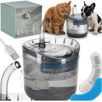 Produktbild von Ikonka Trinkbrunnen für Katzen und Hunde mit Aktivkohlefilter 1,8 l Automatisch USB Wasserbrunnen Grau Transparent