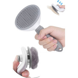 Jungengel Tierbürste zur Fellpflege für Hunde und Katzen in Grau und Weiß aus Kunststoff – Bild 1 von 5