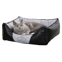 Produktbild von Kerbl Pet Kuschelbett Chiara Hundebett aus Kunstleder für kleine Hunde und Katzen in Grau/Schwarz