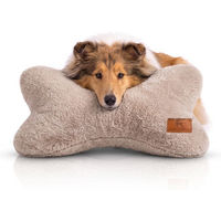 Produktbild von Knuffelwuff Schlafknochen Nilo Hundespielzeug aus Kaninchen Fellimitat Beige