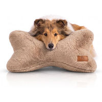 Produktbild von Knuffelwuff Schlafknochen Nilo Hundespielzeug aus Kaninchen Fellimitat Braun