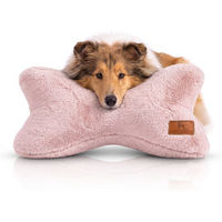 Produktbild von Knuffelwuff Schlafknochen Nilo Hundespielzeug aus Kaninchen Fellimitat Rosa