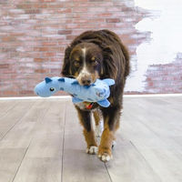 Produktbild von Kong Dynos Roars Apportierspielzeug aus Plüsch für mittelgroße und große Hunde in Blau