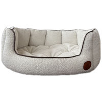 Produktbild von LokiLux Muschelbett Elli Hundebett und Katzenbett aus Bouclé in Weiß Größe M