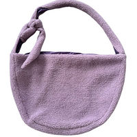 Produktbild von LokiLux Sling-Tragetasche Huggy für Hunde und Katzen aus Bouclé in Lila Größe M