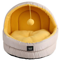 Produktbild von Minus One Katzenhöhle Hideaway Cat Cave aus Fleece in Gelb mit Spielzeugball