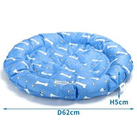 Produktbild von nobleza Rundes Kühlbett für Hunde mit Pfoten und Knochen Design in Blau und Weiß