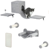 Produktbild von PawHut Katzen Kletterwand Set 6-teilig aus Holz mit Katzenhaus Hängematte und Kratzbrett Grau