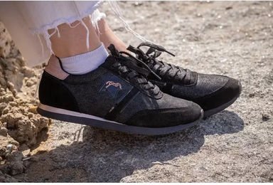 Produktbild von Pénélope Saturne Sneakers aus Leder in Schwarz-Gold Unisex