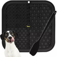 Produktbild von Purlov Antistressmatte für Hunde als Schleckmatte und Leckschale aus Silikon in Schwarz mit Massagefunktion und Langsamfresser-Rillen