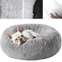 Produktbild von Purlov Hundebett und Katzenbett aus Kunstfell als rundes Donut-Kuschelbett für kleine und mittlere Hunde und Katzen