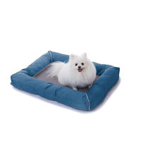 Produktbild von RAIKOU Hundebett und Katzenbett mit abnehmbarem waschbarem Bezug und wasserabweisendem Boden Blau 80 x 60 cm