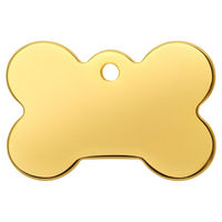 Produktbild von Red Dingo Hundemarke Titan beschichtet in Gold mit individueller Gravur Knochen Form aus Edelstahl