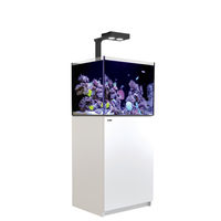 Produktbild von Red Sea REEFER 170 Deluxe G2 Meerwasseraquarium mit LED-Aufsetzleuchte und weißem Unterschrank