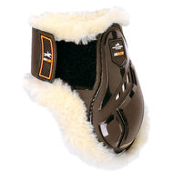 Produktbild von Schockemöhle Air Flow Champion Fetlock Boots Streichkappen aus Kunstleder mit veganem Schaffell für Vollblut