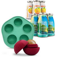 Produktbild von SmoothieDog Hundesmoothie Set mit Trinkpause Ente und Immunio Rind sowie befüllbarer Schleckball aus Naturkautschuk in Grün
