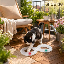 SNOEKIE Katzen-Spielschiene mit Ball aus Kunststoff in Weiß und Transparent – Bild 1 von 2