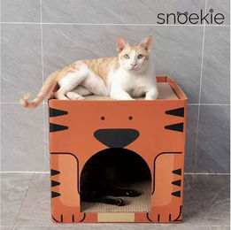 SNOEKIE Würfel-Katzenhöhle mit Kratzbrett aus Wellpappe für Katzen in Orange – Bild 1 von 2