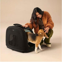 Produktbild von Tavo Crispin Transportbox Medium für Hunde und Katzen in Schwarz mit Memory Foam Matratze und ECE R129 Zertifizierung