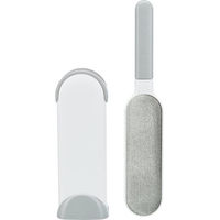 Produktbild von Trixie Fusselbürste mit Reinigungsstation für Hunde in Weiß/Grau