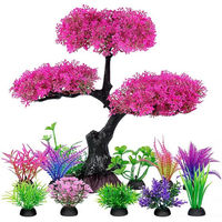 Produktbild von TUWENA Aquariendeko Set aus Kunststoff mit künstlichen Pflanzen und Bäumen in Rosa und Bunt für Fische
