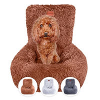 Produktbild von Wahre Tierliebe Fluffy Hund Autositz aus Plüsch mit Sicherheitsgurt schwarz weiß für kleine mittlere und große Hunde