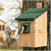 Produktbild von Zooprinz Nistkasten für Wildvögel aus Massivholz mit Räuberschutz und klappbarer Front in Grün